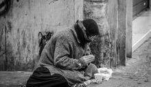 1595494816_grayscale-photography-of-man-praying-on-sidewalk-with-food-1058068.jpg